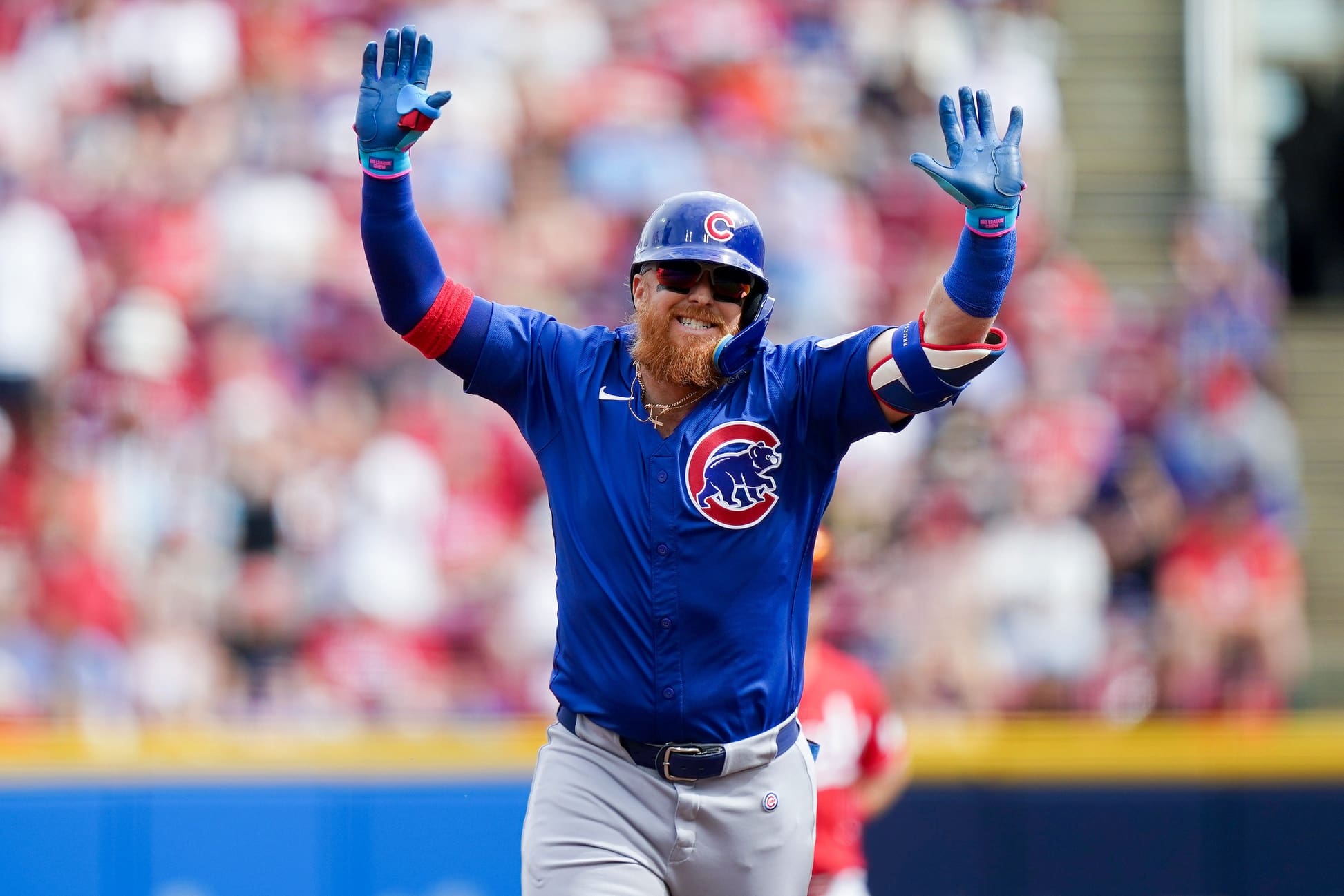 Chicago Cubs first baseman Justin Turner (3) celebrates while running the bases after hitting a homer in the third inning of the MLB National League game between the Cincinnati Reds and Chicago Cubs, Saturday, May 24, 2025, at Great American Ball Park in Downtown Cincinnati.