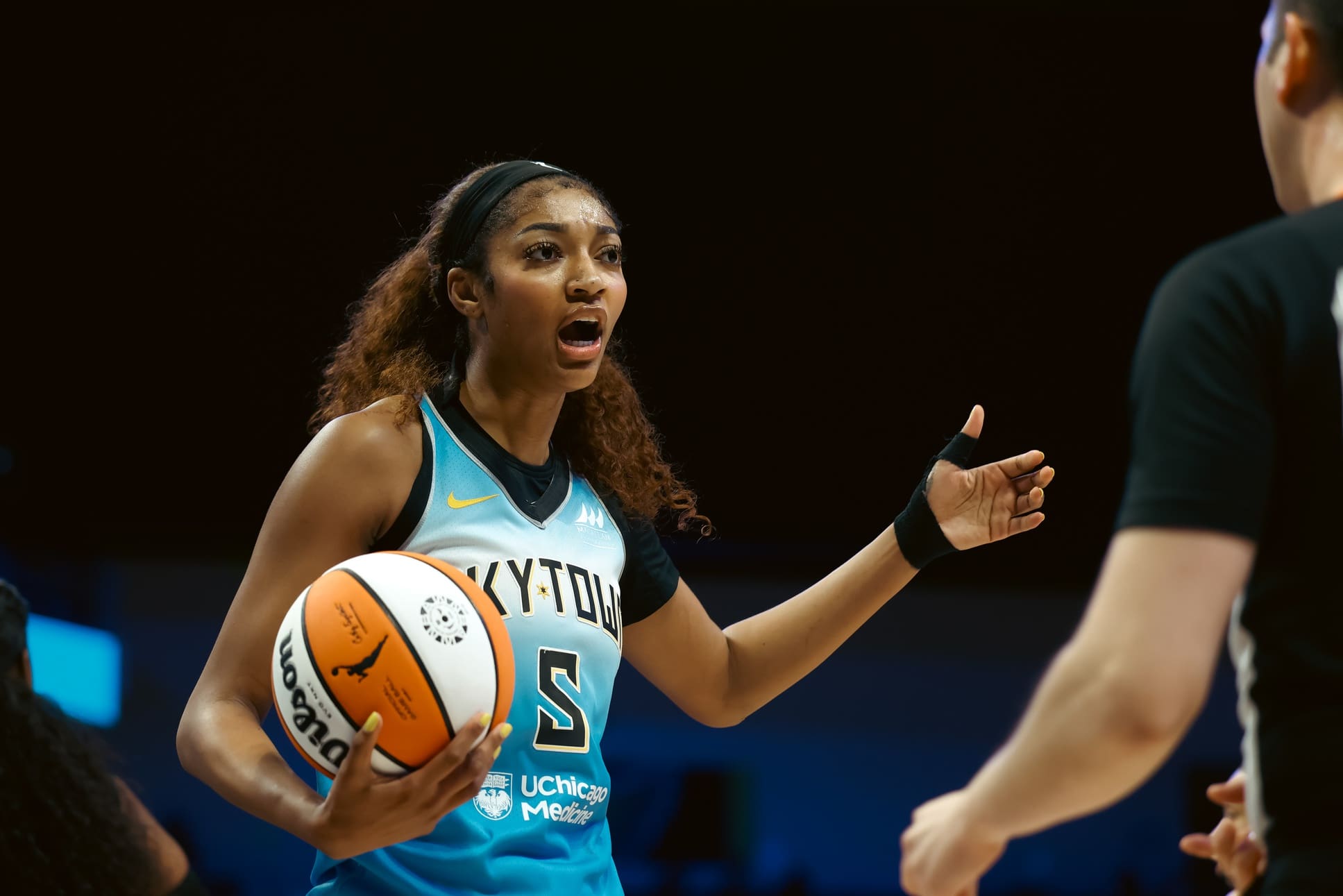 May 31, 2025; Arlington, Texas, USA; Chicago Sky forward Angel Reese (5) reacts to an official during the first half against the Dallas Wings at College Park Center. Mandatory Credit: Chris Jones-Imagn Images