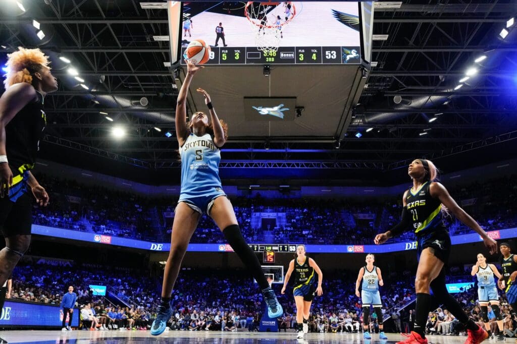 May 31, 2025; Arlington, Texas, USA; Chicago Sky forward Angel Reese (5) scores a layup against the Dallas Wings during the second half at College Park Center. Mandatory Credit: Chris Jones-Imagn Images