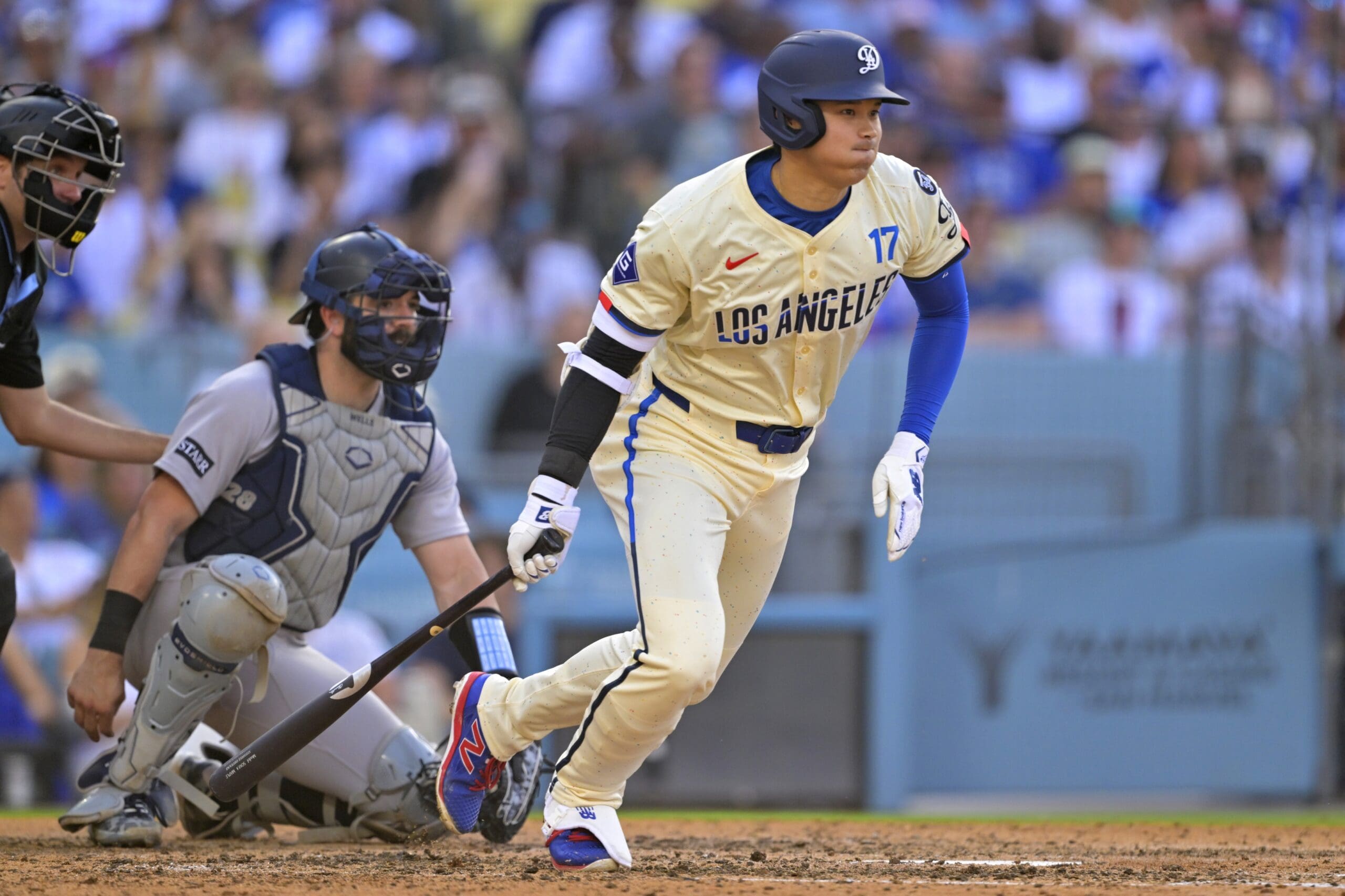 May 31, 2025; Los Angeles, California, USA; Los Angeles Dodgers designated hitter Shohei Ohtani (17) singles in the fifth inning at Dodger Stadium. Mandatory Credit: Jayne Kamin-Oncea-Imagn Images