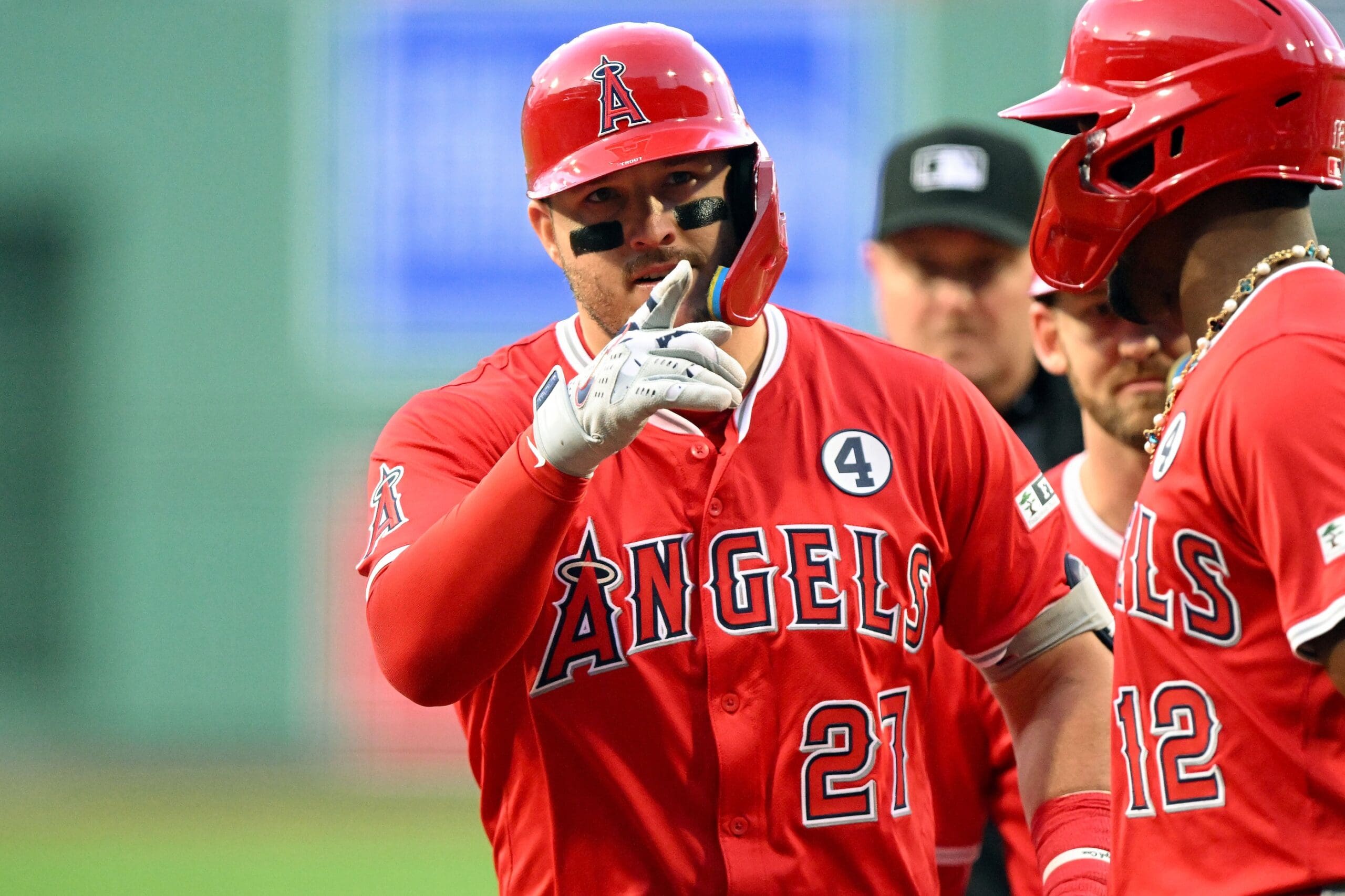 Jun 2, 2025; Boston, Massachusetts, USA; Los Angeles Angels outfielder Mike Trout (27) reacts after hitting a three-run home run against the Boston Red Sox during the first inning at Fenway Park. Mandatory Credit: Brian Fluharty-Imagn Images