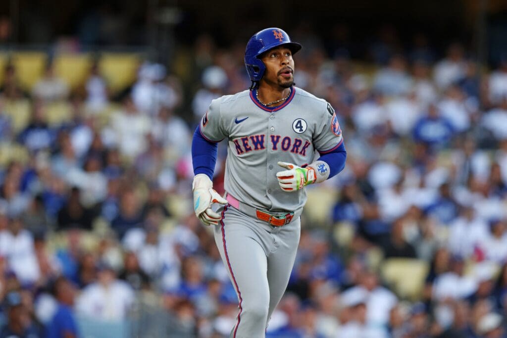 Jun 2, 2025; Los Angeles, California, USA; New York Mets shortstop Francisco Lindor (12) rounds the bases during the first inning against the Los Angeles Dodgers during the first inning against the New York Mets at Dodger Stadium. Mandatory Credit: Jason Parkhurst-Imagn Images