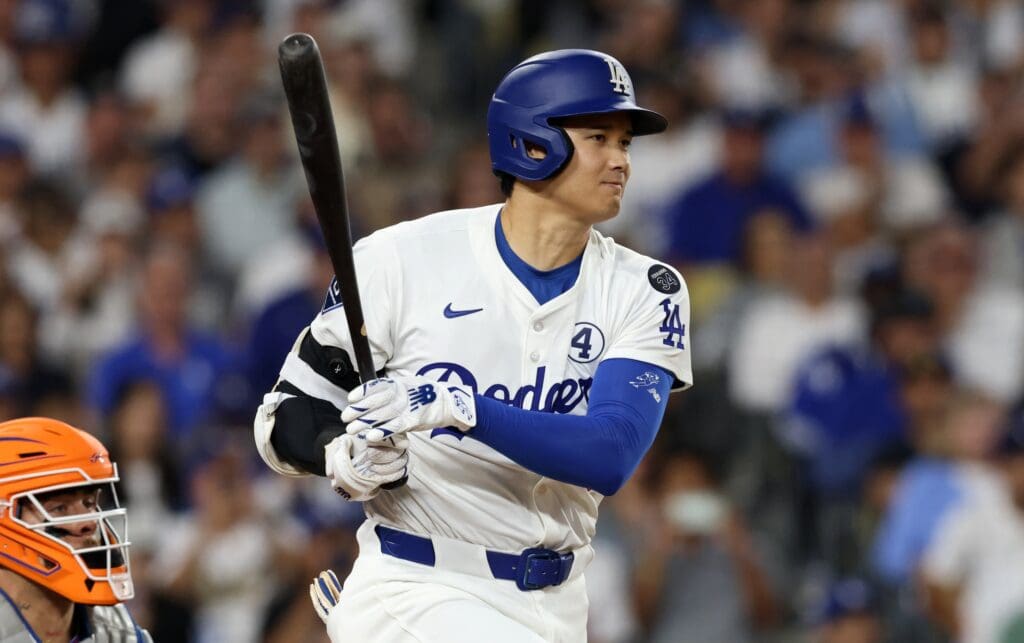 Jun 2, 2025; Los Angeles, California, USA; Los Angeles Dodgers designated hitter Shohei Ohtani (17) grounds out during the fifth inning against the New York Mets at Dodger Stadium. Mandatory Credit: Jason Parkhurst-Imagn Images