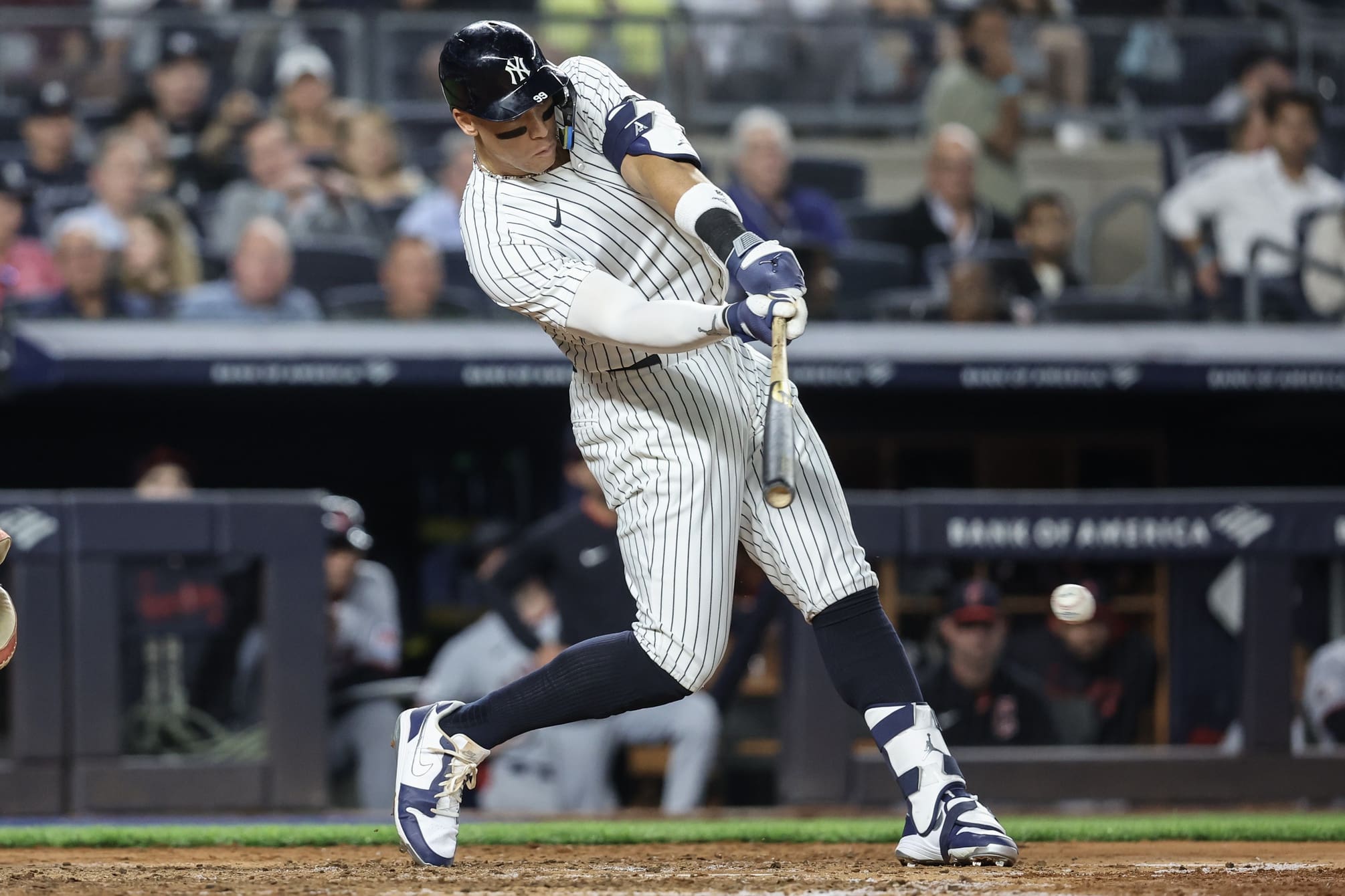 Jun 4, 2025; Bronx, New York, USA; New York Yankees right fielder Aaron Judge (99) hits a single in the sixth inning against the Cleveland Guardians at Yankee Stadium. Mandatory Credit: Wendell Cruz-Imagn Images