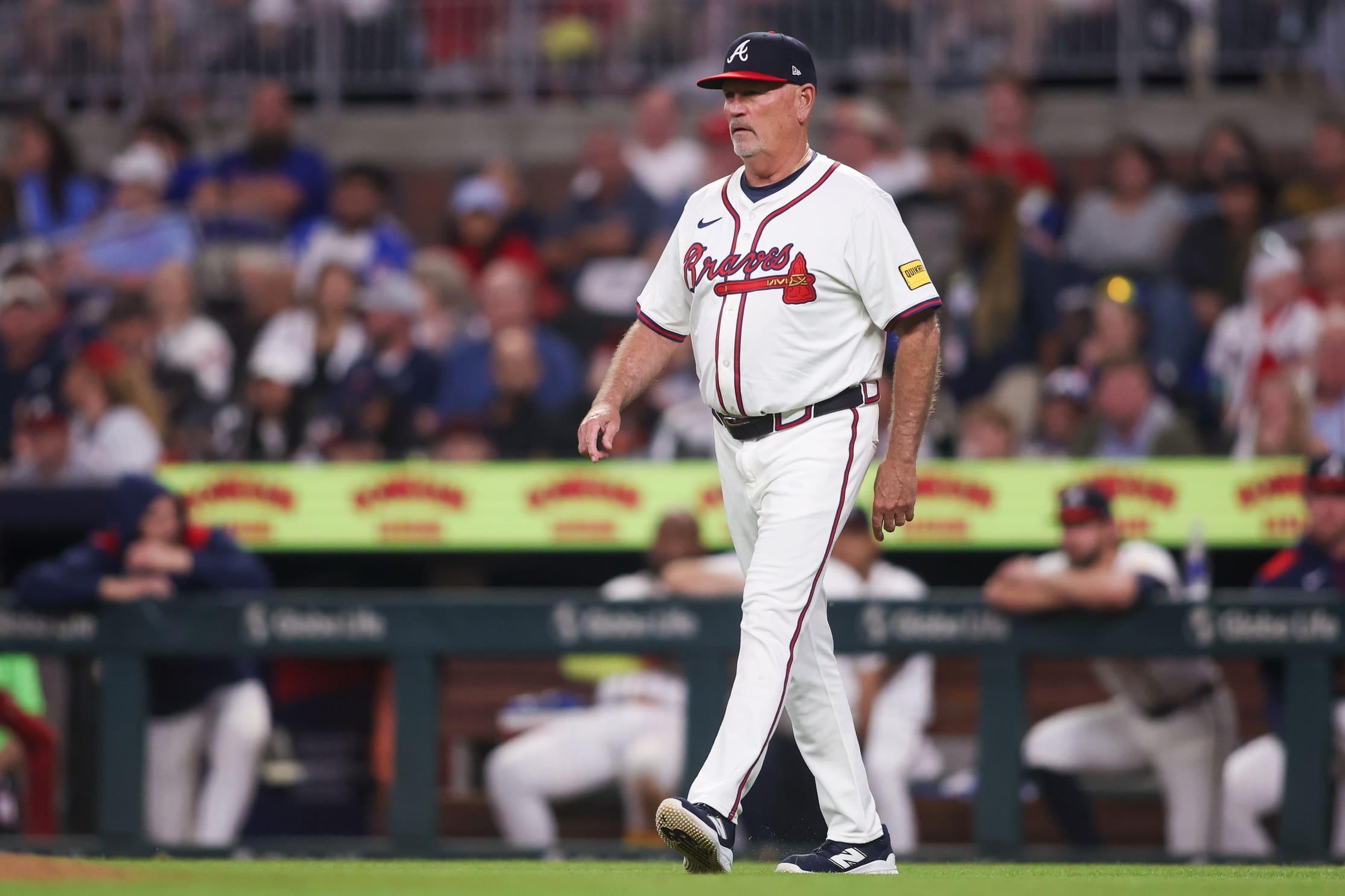 Jun 4, 2025; Atlanta, Georgia, USA; Atlanta Braves manager Brian Snitker (43) walks on the field against the Arizona Diamondbacks in the eighth inning at Truist Park. Mandatory Credit: Brett Davis-Imagn Images