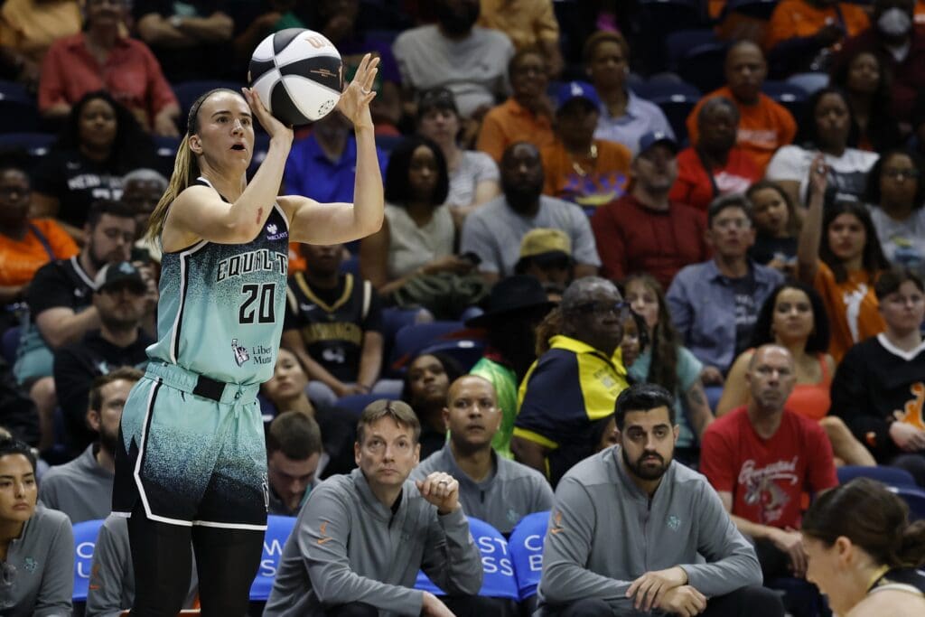 Jun 5, 2025; Washington, District of Columbia, USA; New York Liberty guard Sabrina Ionescu (20) makes a three point field goal against the Washington Mystics in the first half at Entertainment & Sports Arena. Ionescu broke the franchise record for made three point field goals with the shot. Mandatory Credit: Geoff Burke-Imagn Images