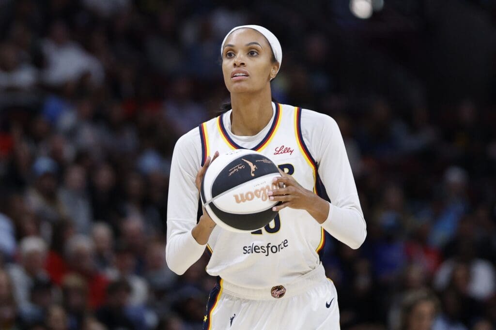 Jun 7, 2025; Chicago, Illinois, USA; Indiana Fever forward DeWanna Bonner (25) shoots against the Chicago Sky during the first half of a WNBA game at United Center. Mandatory Credit: Kamil Krzaczynski-Imagn Images