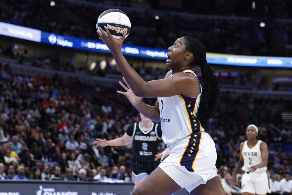 Jun 7, 2025; Chicago, Illinois, USA; Indiana Fever forward Aliyah Boston (7) drives to the basket against the Chicago Sky during the first half of a WNBA game at United Center. Mandatory Credit: Kamil Krzaczynski-Imagn Images