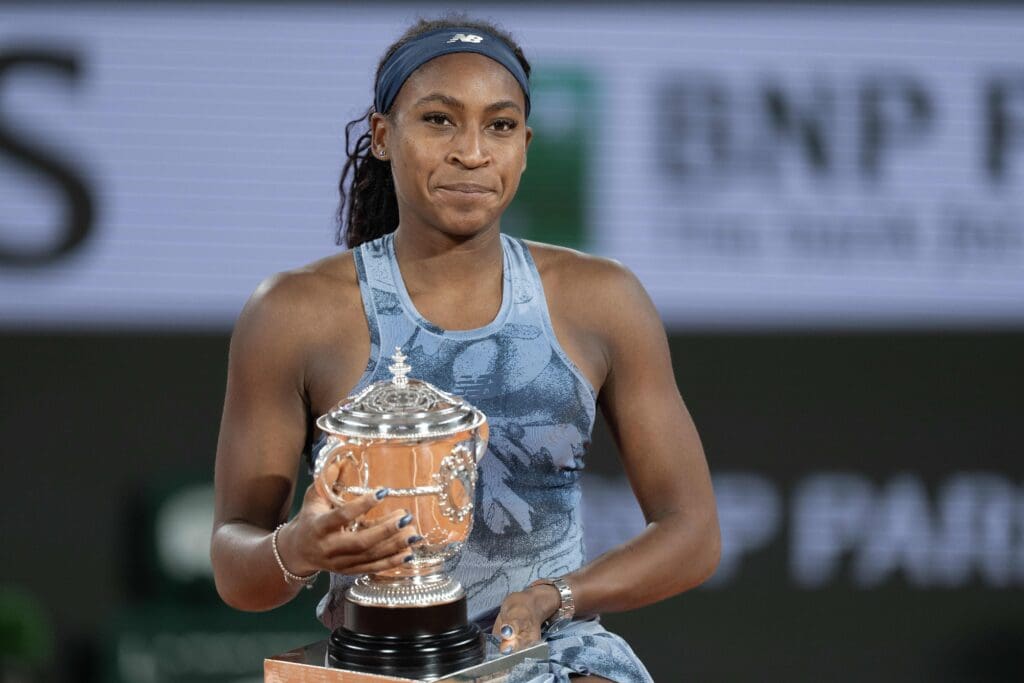 Jun 7, 2025; Paris, FR; Coco Gauff of the United States poses with the trophy after winning the womens singles final against Aryna Sabalenka on day 14 at Roland Garros Stadium. Mandatory Credit: Susan Mullane-Imagn Images