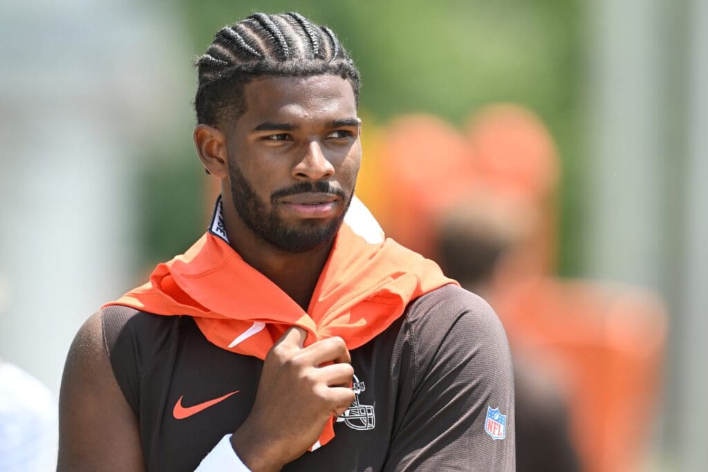 Jun 10, 2025; Berea, OH, USA; Cleveland Browns quarterback Shedeur Sanders (12) walks off the field during minicamp at CrossCountry Mortgage Campus. Mandatory Credit: Ken Blaze-Imagn Images