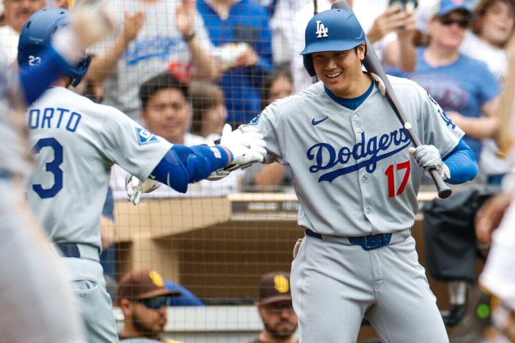 Jun 11, 2025; San Diego, California, USA; Los Angeles Dodgers left fielder Michael Conforto (23) celebrates with designated hitter Shohei Ohtani (17) after hitting a one run home run during the fifth inning against the San Diego Padres at Petco Park. Mandatory Credit: David Frerker-Imagn Images