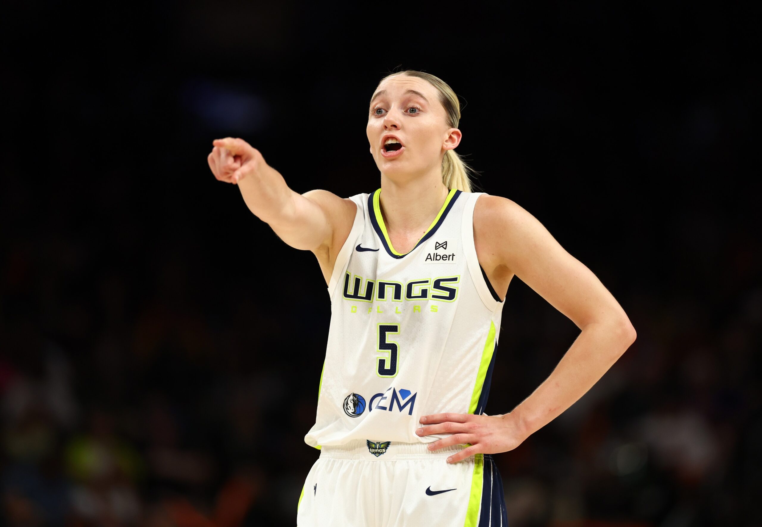 Jun 11, 2025; Phoenix, Arizona, USA; Dallas Wings guard Paige Bueckers (5) reacts against the Phoenix Mercury in the first half at PHX Arena. Mandatory Credit: Mark J. Rebilas-Imagn Images