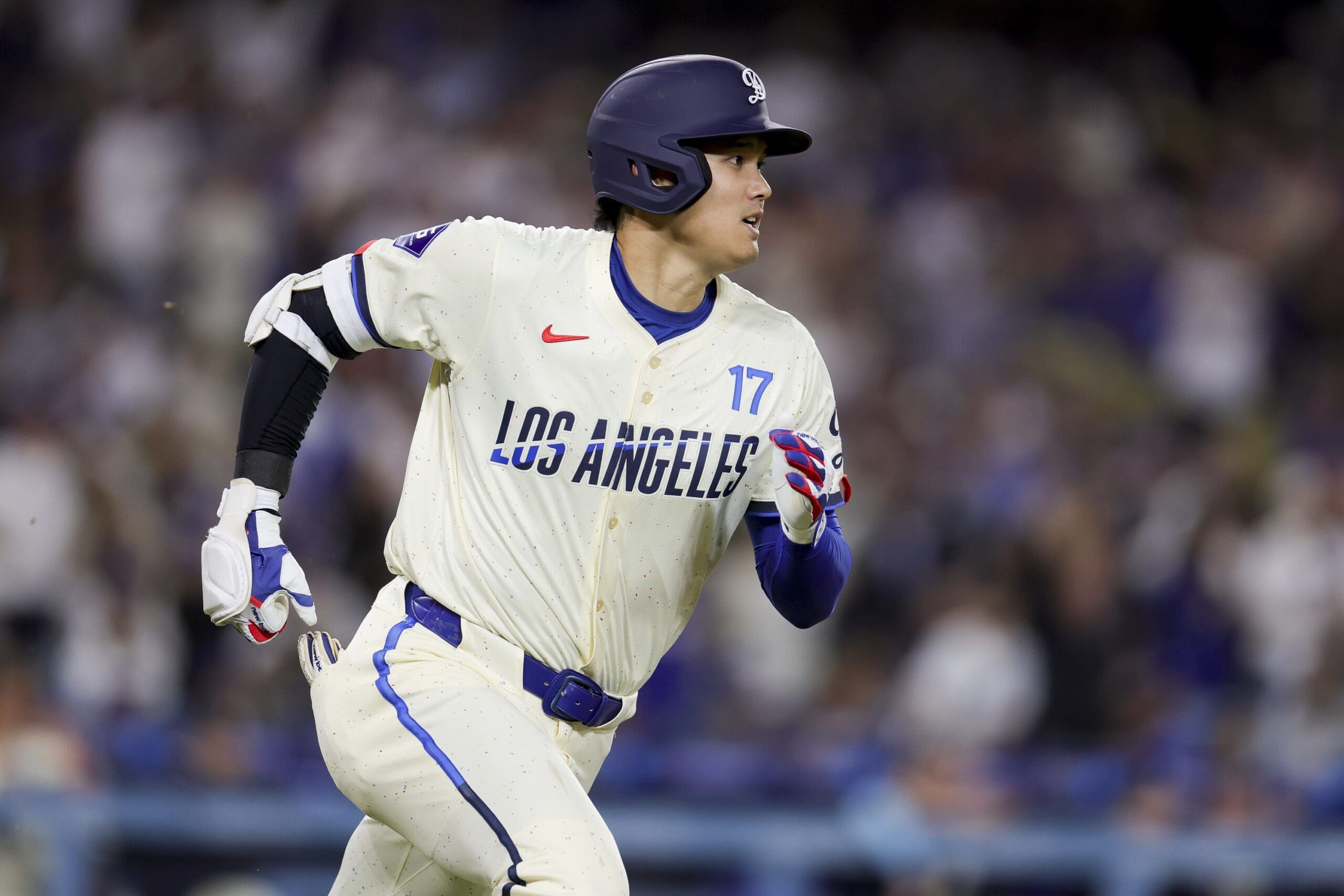 Jun 14, 2025; Los Angeles, California, USA; Los Angeles Dodgers designated hitter Shohei Ohtani runs after hitting a solo home-run during the sixth inning of a baseball game against the San Francisco Giants at Dodger Stadium. Mandatory Credit: Ryan Sun-Imagn Images