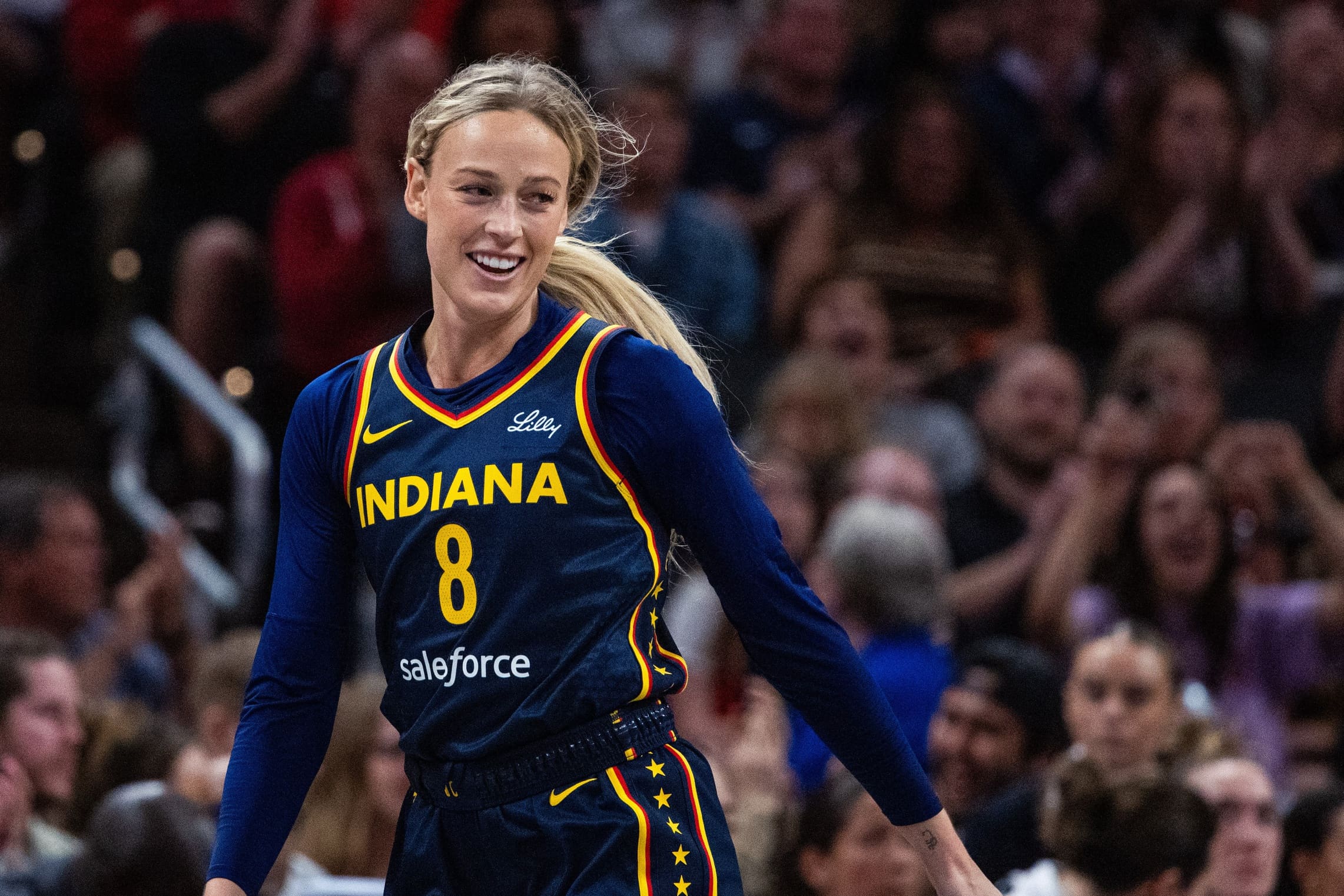 Jun 17, 2025; Indianapolis, Indiana, USA; Indiana Fever guard Sophie Cunningham (8) in the second half against the Connecticut Sun at Gainbridge Fieldhouse. Mandatory Credit: Trevor Ruszkowski-Imagn Images