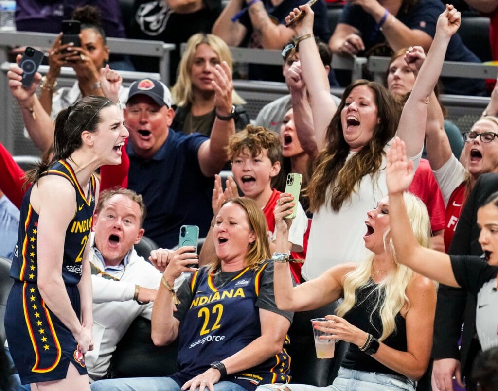Indiana Fever guard Caitlin Clark (22) celebrates after scoring a 3-pointer Tuesday, June 17, 2025, during a game between the Indiana Fever and the Connecticut Sun at Gainbridge Fieldhouse in Indianapolis. The Indiana Fever defeated the Connecticut Sun, 88-71.