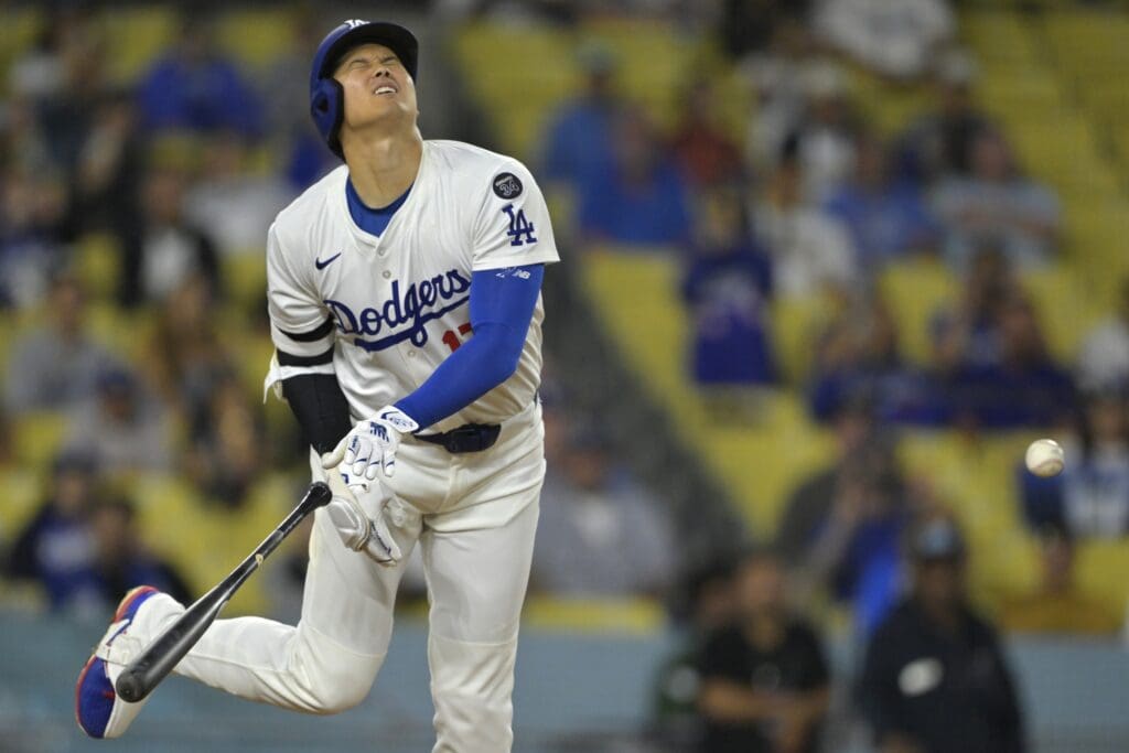 Jun 19, 2025; Los Angeles, California, USA; Los Angeles Dodgers designated hitter Shohei Ohtani (17) reacts after he was hit by a pitch in the ninth inning against the San Diego Padres at Dodger Stadium. Mandatory Credit: Jayne Kamin-Oncea-Imagn Images