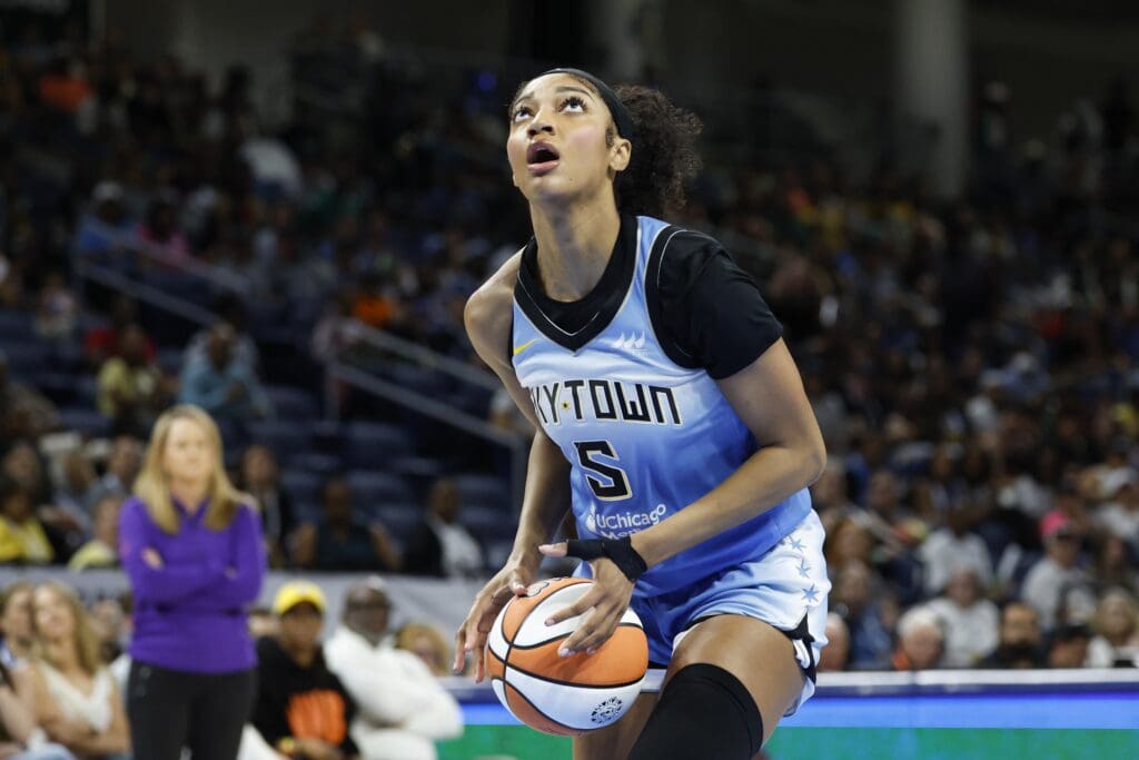 Jun 24, 2025; Chicago, Illinois, USA; Chicago Sky forward Angel Reese (5) goes to the basket against the Los Angeles Sparks during the first half at Wintrust Arena. Mandatory Credit: Kamil Krzaczynski-Imagn Images
