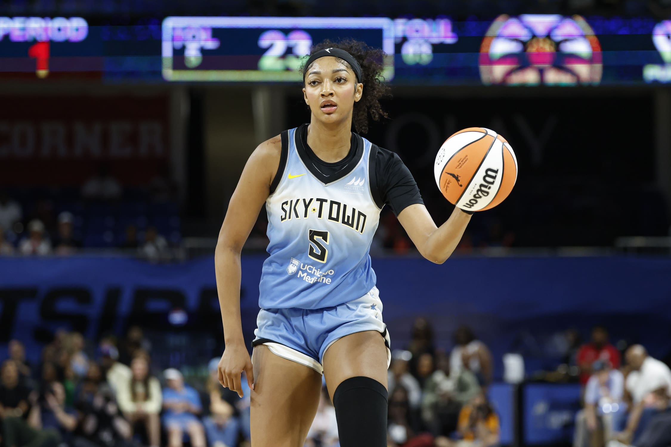 Jun 24, 2025; Chicago, Illinois, USA; Chicago Sky forward Angel Reese (5) brings the ball up court against the Los Angeles Sparks during the first half at Wintrust Arena. Mandatory Credit: Kamil Krzaczynski-Imagn Images