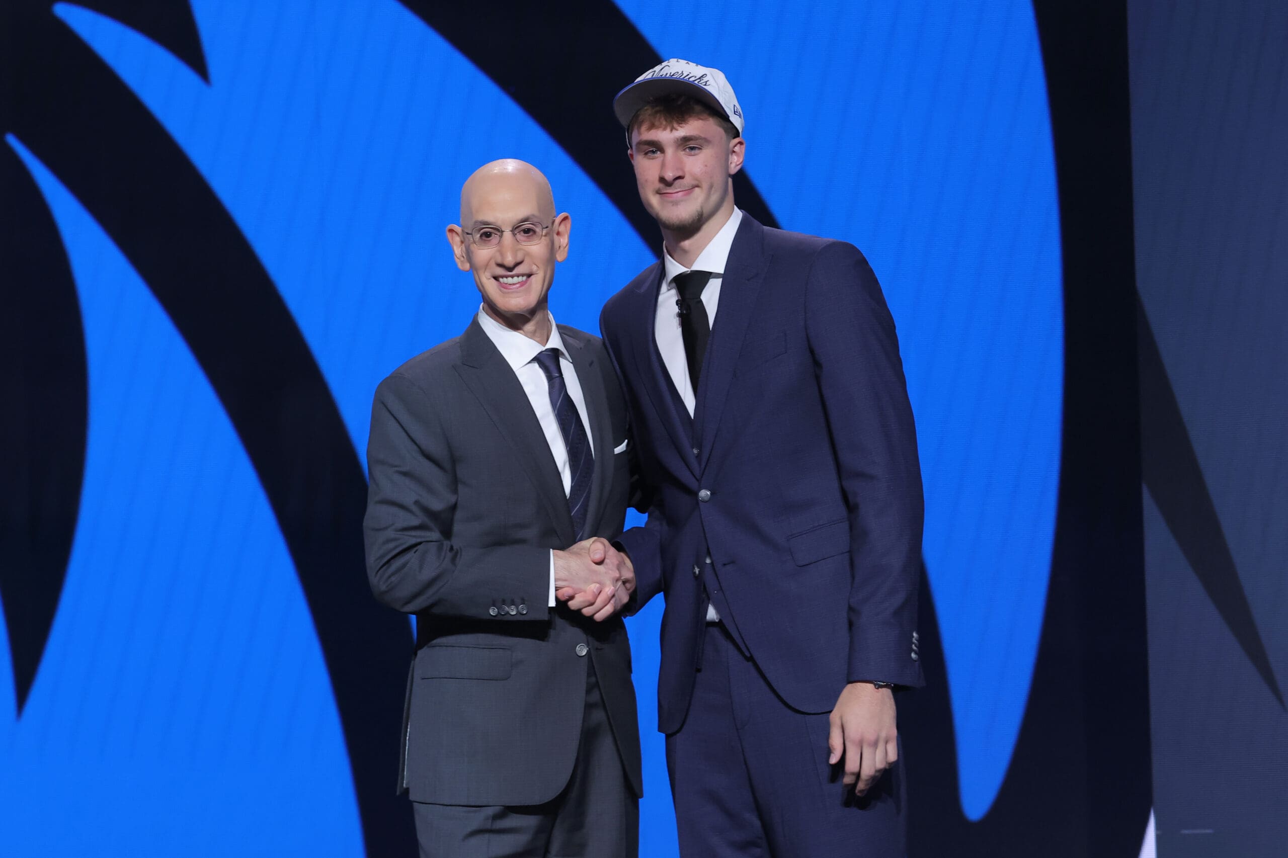 Jun 25, 2025; Brooklyn, NY, USA; Cooper Flagg poses with NBA commissioner Adam Silver after being selected as first overall by the Dallas Mavericks in the first round of the 2025 NBA Draft at Barclays Center.