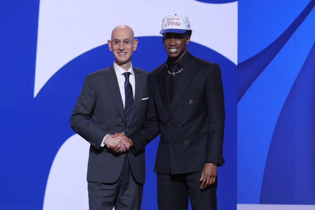 Jun 25, 2025; Brooklyn, NY, USA; VJ Edgecombe stands with NBA commissioner Adam Silver after being selected as the third pick by the Philadelphia 76ers in the first round of the 2025 NBA Draft at Barclays Center.