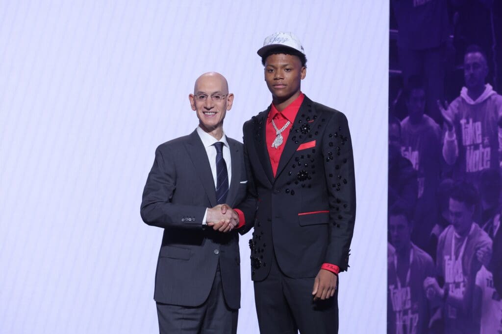Jun 25, 2025; Brooklyn, NY, USA; Ace Bailey stands with NBA commissioner Adam Silver after being selected as the fifth pick by the Utah Jazz in the first round of the 2025 NBA Draft at Barclays Center.