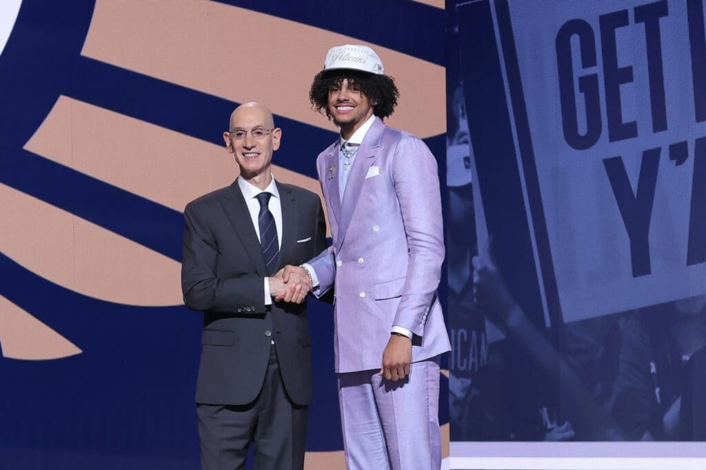 Jun 25, 2025; Brooklyn, NY, USA; Asa Newell stands with NBA commissioner Adam Silver after being selected as the 23rd pick by the New Orleans Pelicans in the first round of the 2025 NBA Draft at Barclays Center.