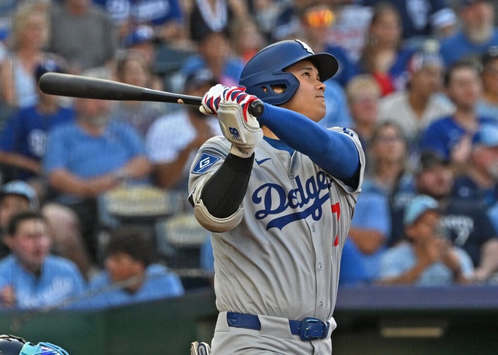 Jun 27, 2025; Kansas City, Missouri, USA; Los Angeles Dodgers designated hitter Shohei Ohtani (17) hits a solo home run in the first inning against the Kansas City Royals at Kauffman Stadium. Mandatory Credit: Peter Aiken-Imagn Images