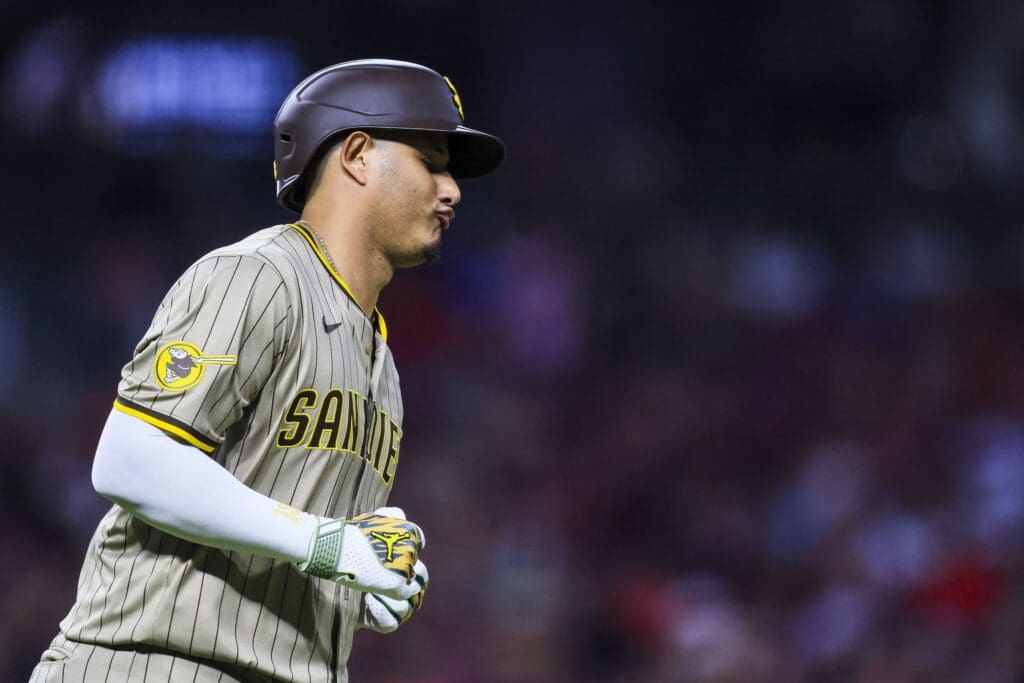 Jun 27, 2025; Cincinnati, Ohio, USA; San Diego Padres third baseman Manny Machado (13) reacts after a play in the seventh inning against the Cincinnati Reds at Great American Ball Park. Mandatory Credit: Katie Stratman-Imagn Images