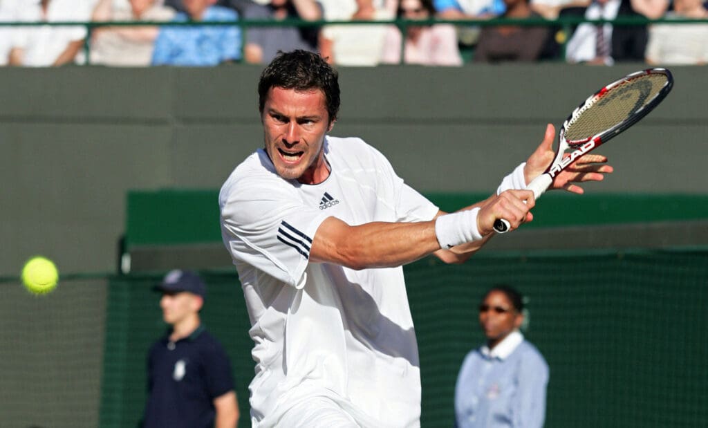 Jul 2, 2008; London, ENGLAND; Marat Safin (RUS) returns a shot against Feliciano Lopez (not pictured) during the quarter finals of the 2008 Wimbledon Championships at the All England Lawn and Tennis Club. Safin defeated Lopez 3-6, 7-5, 7-6, 6-3. Mandatory Credit: Alan Grieves/GEPA via USA TODAY Sports
