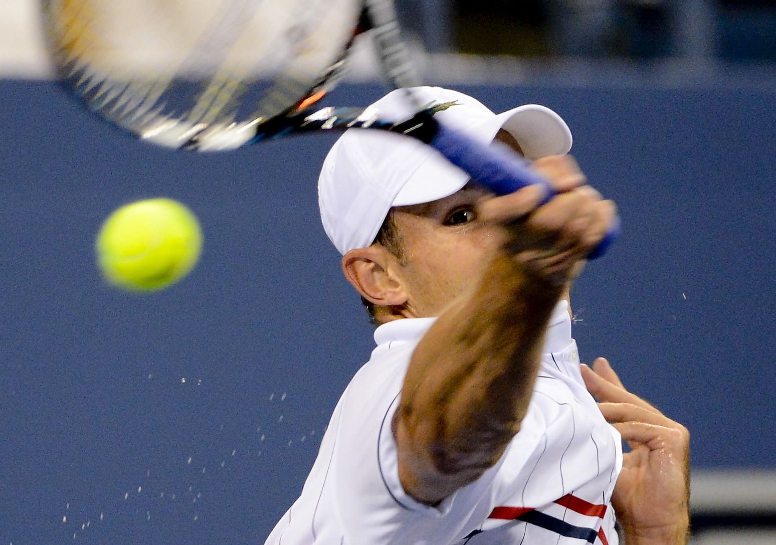Sep 4, 2012; Queens, NY, USA; Andy Roddick (USA) returns a shot against Juan Martin Del Potro (ARG) on day nine of the 2012 US Open at Billie Jean King National Tennis Center. Mandatory Credit: Robert Deutsch-USA TODAY Sports