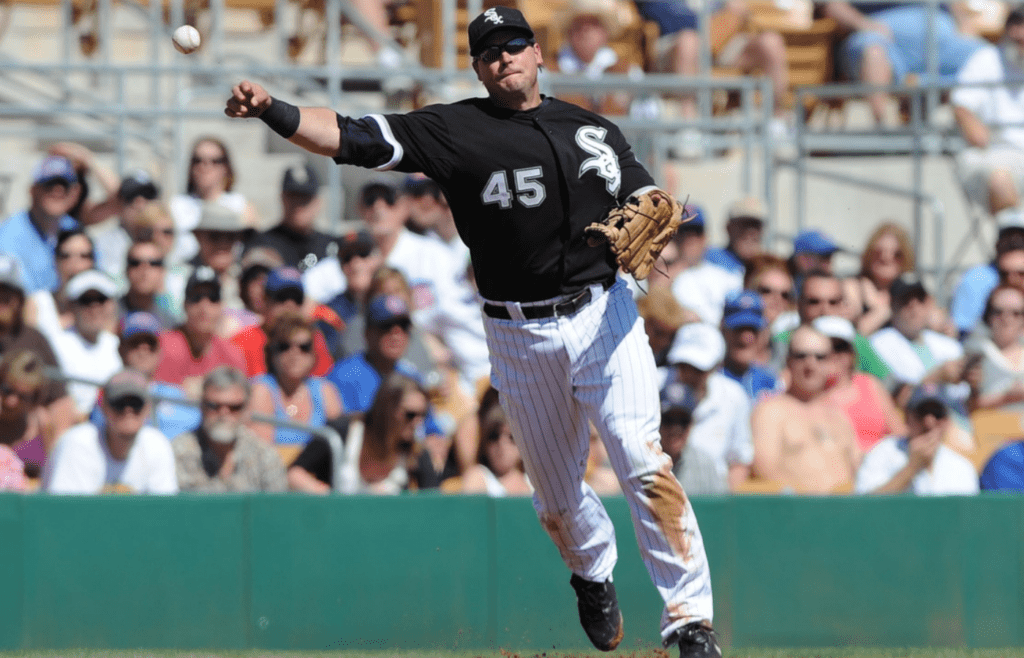 Mar 11, 2011; Glendale, AZ, USA; Chicago White Sox infielder Dallas McPherson (45) throws to first for an out during the first inning against the Chicago Cubs in a game at Camelback Ranch. Mandatory Credit: Christopher Hanewinckel-Imagn Images