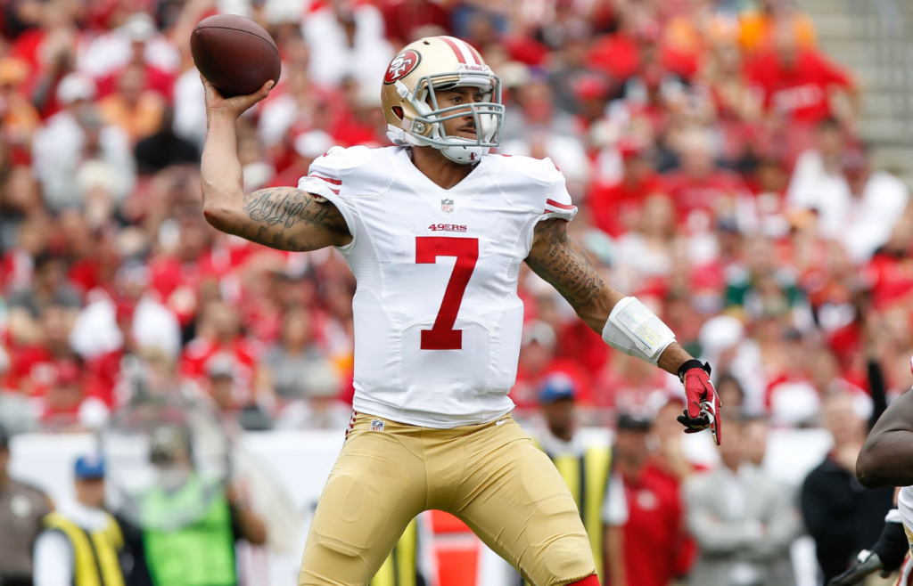 San Francisco 49ers quarterback Colin Kaepernick (7) throws the ball against the Tampa Bay Buccaneers during the first half at Raymond James Stadium.