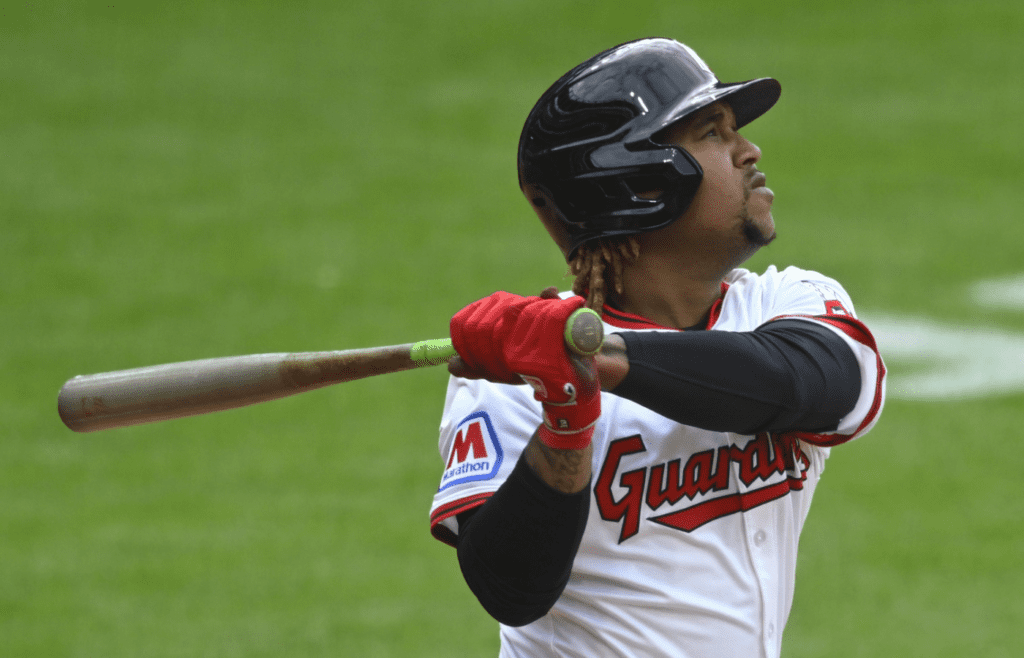 May 31, 2025; Cleveland, Ohio, USA; Cleveland Guardians third baseman Jose Ramirez (11) hits a solo home run in the fifth inning against the Los Angeles Angels at Progressive Field. Mandatory Credit: David Richard-Imagn Images