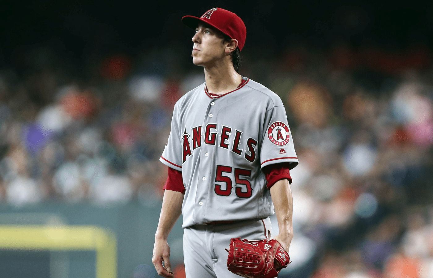 Jul 24, 2016; Houston, TX, USA; Los Angeles Angels starting pitcher Tim Lincecum (55) looks up after a play during the second inning against the Houston Astros at Minute Maid Park. Mandatory Credit: Troy Taormina-Imagn Images