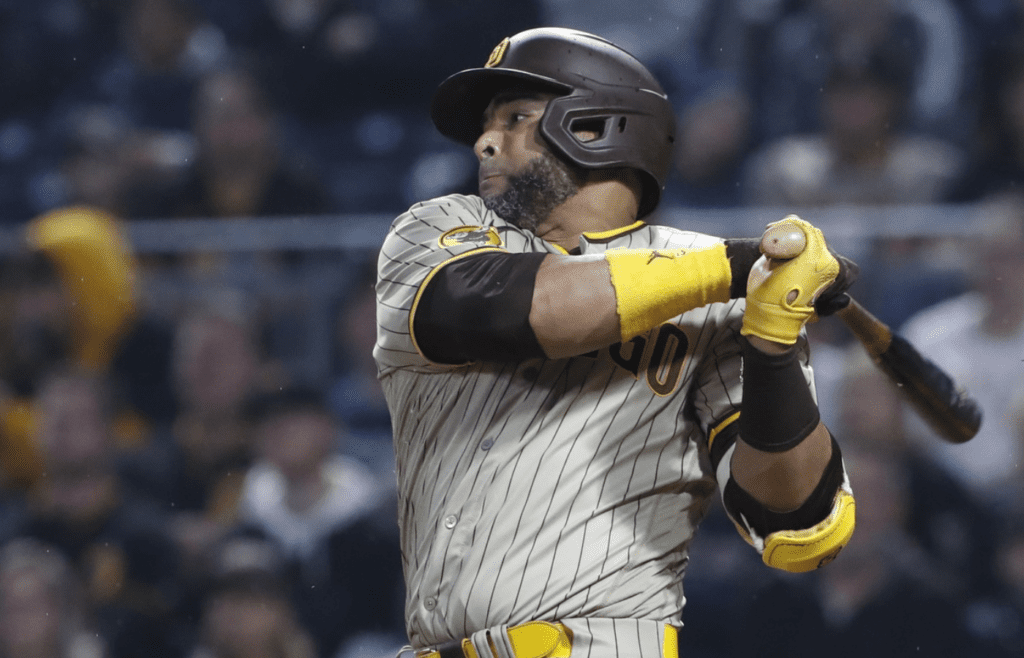 Jun 27, 2023; Pittsburgh, Pennsylvania, USA; San Diego Padres designated hitter Nelson Cruz (32) hits a RBI single against the Pittsburgh Pirates during the sixth inning at PNC Park. Mandatory Credit: Charles LeClaire-Imagn Images
