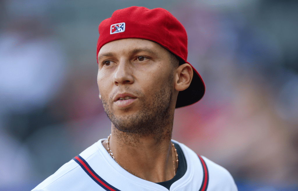 Aug 24, 2024; Atlanta, Georgia, USA; Former Atlanta Braves shortstop Andrelton Simmons (19) on the field before a game against the Washington Nationals at Truist Park. Mandatory Credit: Brett Davis-Imagn Images