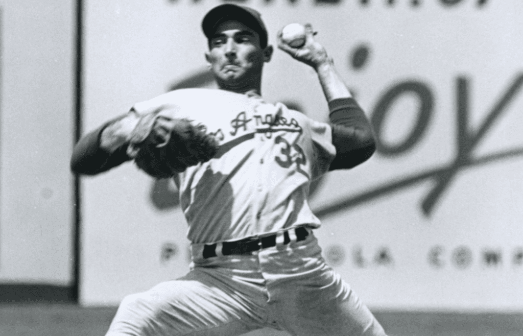 Unknown date and location; Los Angeles Dodgers pitcher #32 Sandy Koufax in action. Koufax led the Dodgers to three World Series titles and had a 0.95 earned run average in four World Series. Koufax also threw four no-hitters in four consecutive seasons and set a new mark for strikeouts with 382 in 1965. Mandatory Credit: Malcolm Emmons-Imagn Images
