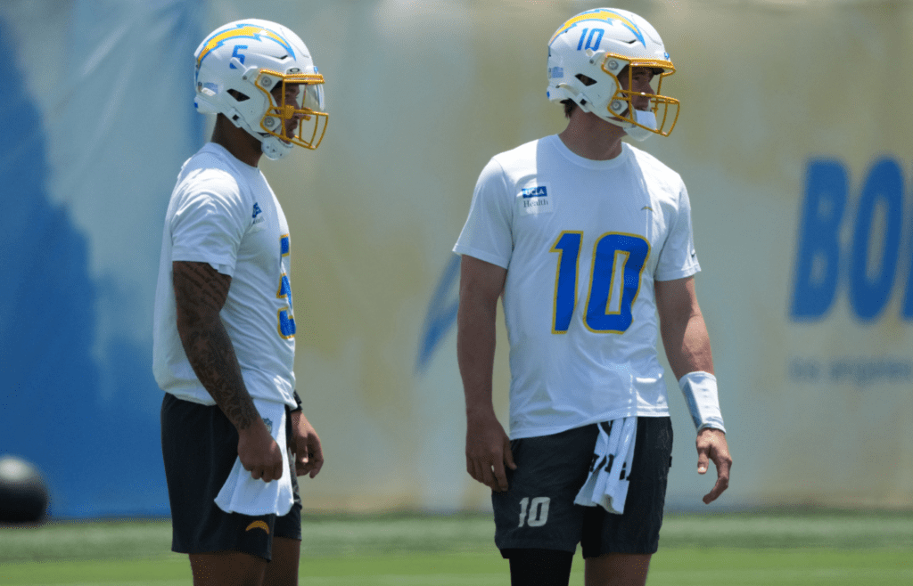 May 27, 2025; El Segundo, CA, USA; Los Angeles Chargers quarterbacks Trey Lance (5) and Justin Herbert (10) during organized team activities at The Bolt. Mandatory Credit: Kirby Lee-Imagn Images