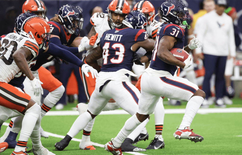 Dec 24, 2023; Houston, Texas, USA; Houston Texans special teams Dameon Pierce (31) returns a kick off for 98 yards against the Cleveland Browns in the second quarter at NRG Stadium. Mandatory Credit: Thomas Shea-Imagn Images