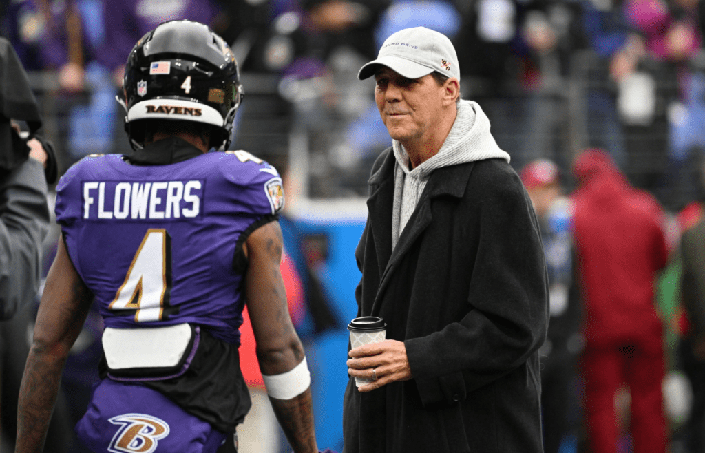 Jan 28, 2024; Baltimore, Maryland, USA; Baltimore Ravens ower Steve Bisciotti (right) talks with Baltimore Ravens wide receiver Zay Flowers (4) prior to the AFC Championship football game against the Kansas City Chiefs at M&T Bank Stadium. Mandatory Credit: Tommy Gilligan-Imagn Images