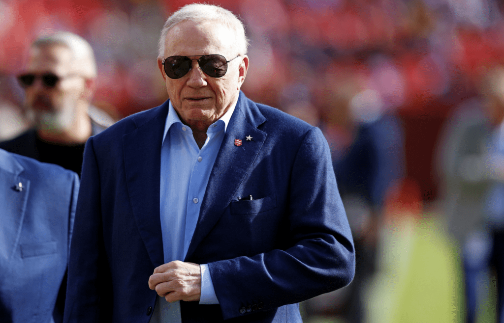 Nov 24, 2024; Landover, Maryland, USA; Dallas Cowboys owner Jerry Jones walks off the field before the game between the Washington Commanders and the Dallas Cowboys at Northwest Stadium. Mandatory Credit: Peter Casey-Imagn Images