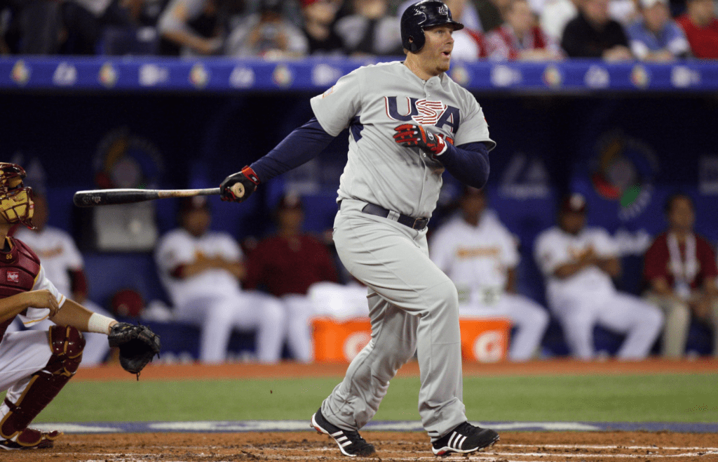 Mar 8, 2009; Toronto, ON, Canada; USA right fielder Adam Dunn (17) singles in the 4th inning against Venezuela during first round pool play at the 2009 World Baseball Classic at the Rogers Centre. Mandatory Credit: Tom Szczerbowski-Imagn Images