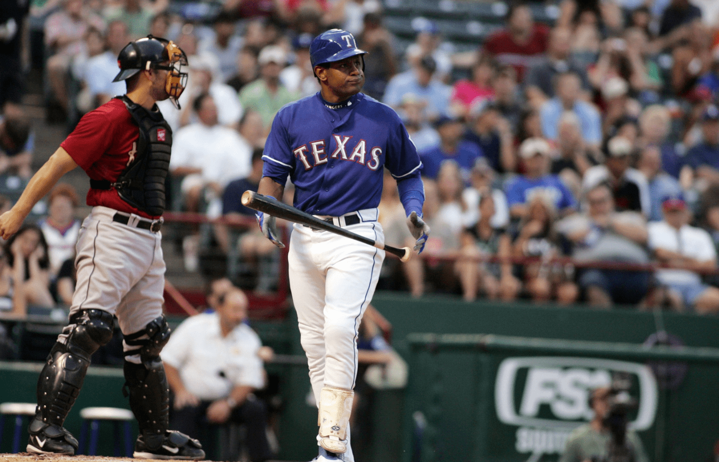 June 24, 2007; Arlington, TX, USA; Texas Rangers designated hitter (21) Sammy Sosa reacts to striking out in the 2nd inning against the Houston Astros at Rangers Ballpark in Arlington, TX. Mandatory Credit: Tim Heitman-Imagn Images (c) copyright 2007