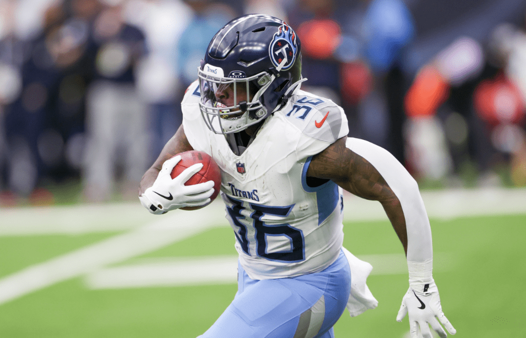 Nov 24, 2024; Houston, Texas, USA; Tennessee Titans special teams Julius Chestnut (36) returns the kick off against the Houston Texans in the first quarter at NRG Stadium. Mandatory Credit: Thomas Shea-Imagn Images
