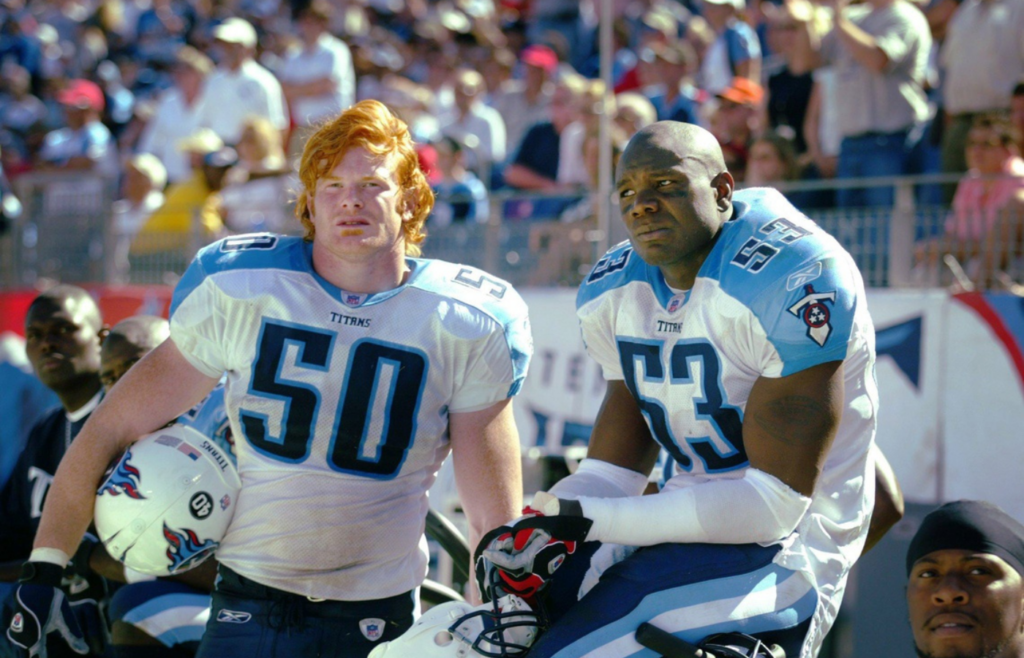 Tennessee Titans lInebackers Rocky Boiman (50) and Keith Bulluck (53) watch as their team lost to the Indianapolis Colts 31 to 17 in their home opener at the Adelphia Coliseum in Nashville on Sept. 19, 2004.