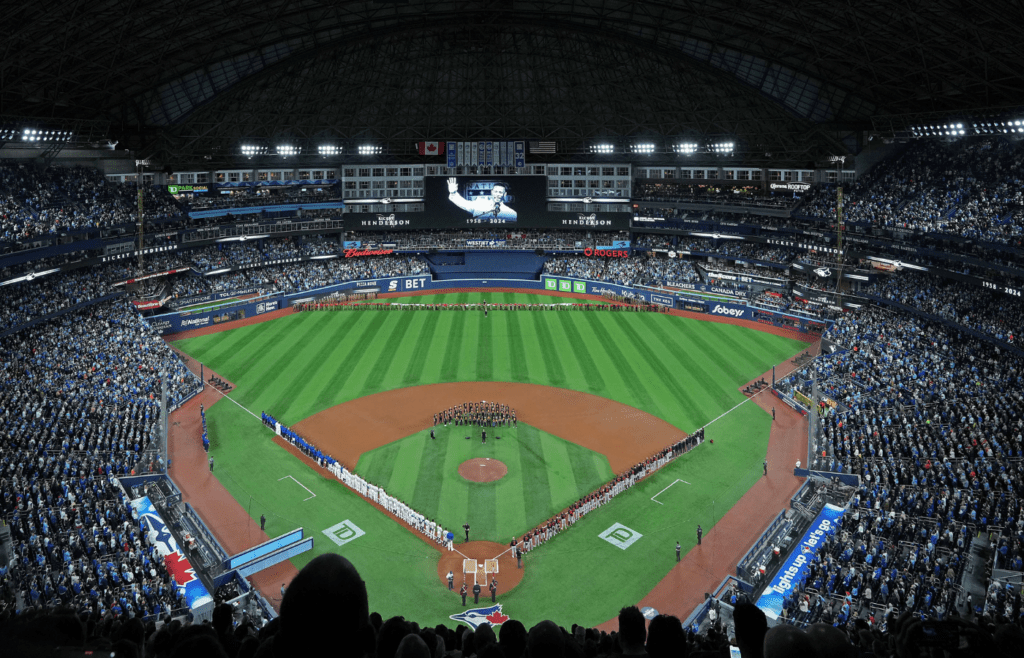 Mar 27, 2025; Toronto, Ontario, CAN; A general view of the Rogers Centre during the opening day ceremonies for a moment of silence for former Toronto Blue Jays player Rickey Henderson before a game against the Baltimore Orioles. Mandatory Credit: Nick Turchiaro-Imagn Images