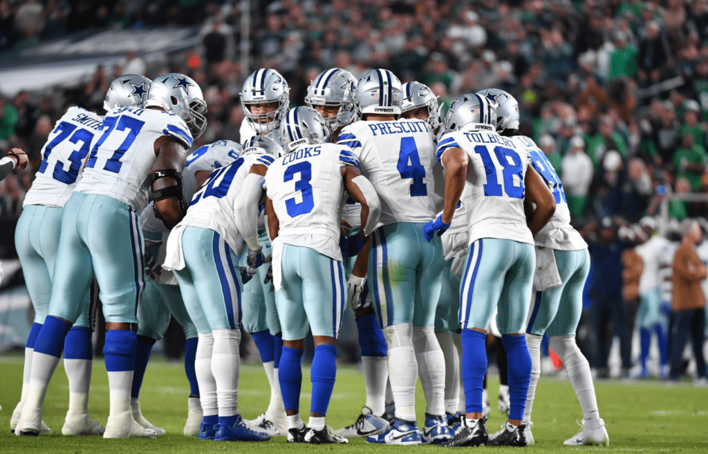 Nov 5, 2023; Philadelphia, Pennsylvania, USA; Dallas Cowboys quarterback Dak Prescott (4) leads his team in the huddle against the Philadelphia Eagles at Lincoln Financial Field. Mandatory Credit: Eric Hartline-Imagn Images
