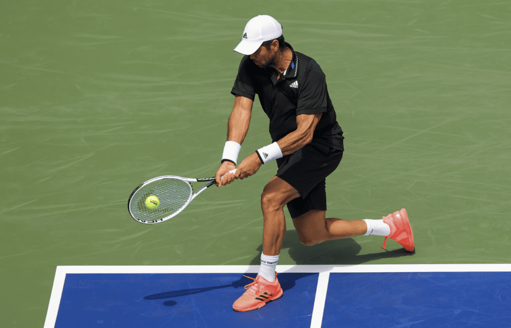 Aug 14, 2021; Mason, OH, USA; Fernando Verdasco (ESP) returns a shot against Richard Gasquet (FRA) during the Western and Southern Open tennis tournament at Lindner Family Tennis Center. Mandatory Credit: Aaron Doster-Imagn Images