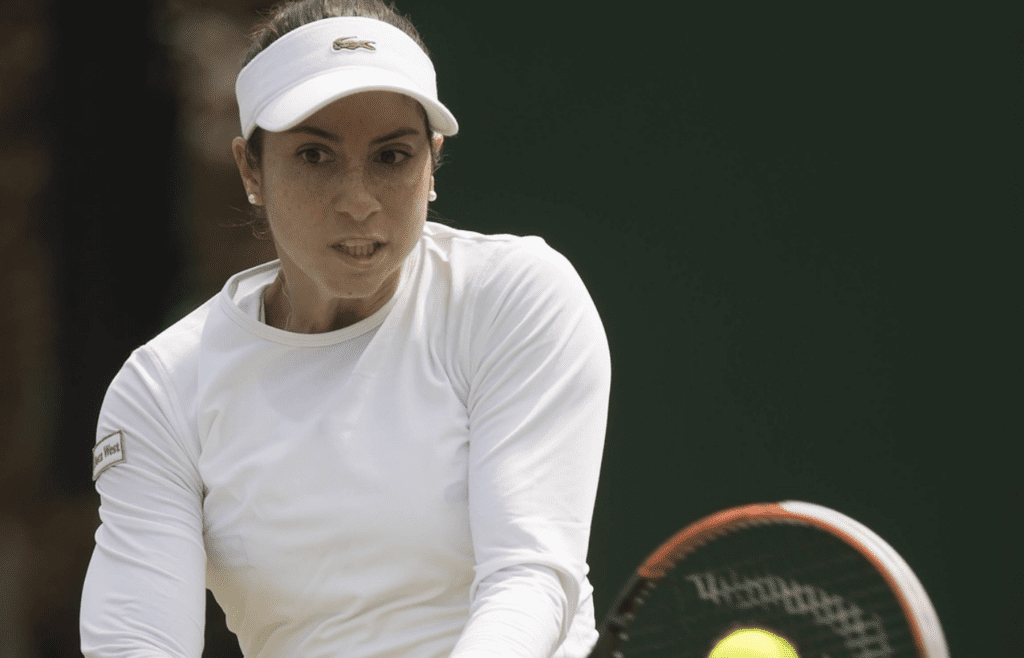 Jun 28, 2016; London, United Kingdom; Christina McHale (USA) in action during her match against Daniela Hantuchova (SVK) on day two of the 2016 The Championships Wimbledon at the All England Lawn Tennis and Croquet Club. Mandatory Credit: Susan Mullane-Imagn Images