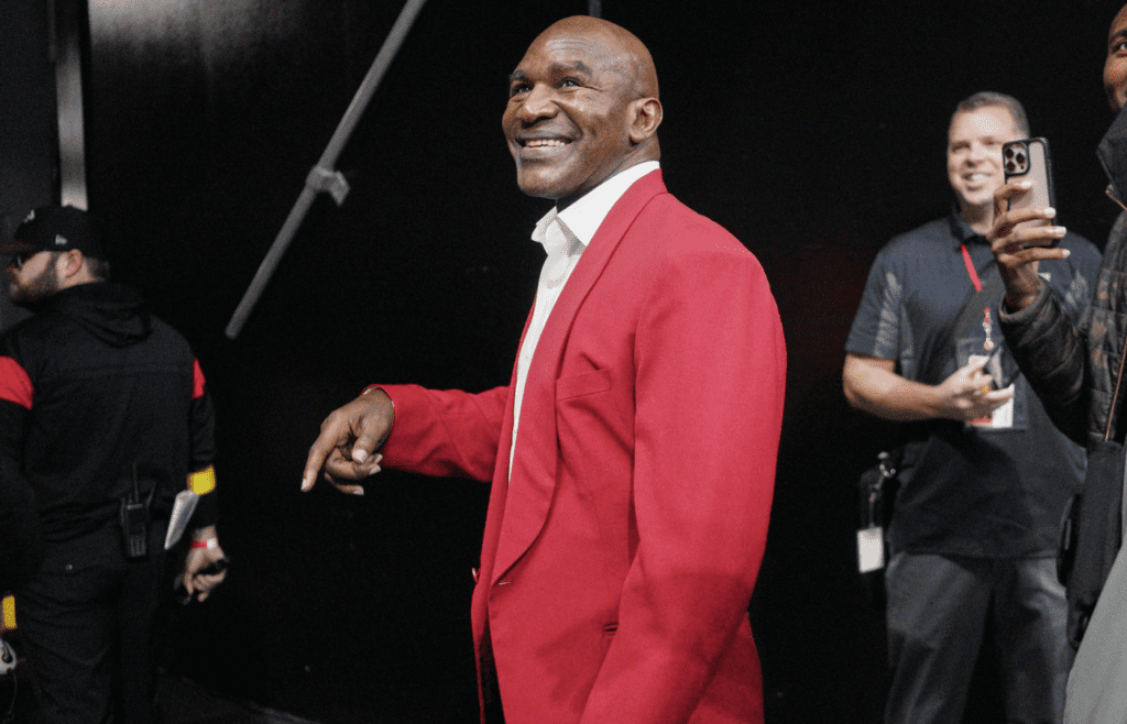 Dec 4, 2022; Atlanta, Georgia, USA; Former boxer Evander Holyfield on the field before a game between the Atlanta Falcons and Pittsburgh Steelers at Mercedes-Benz Stadium. Mandatory Credit: Brett Davis-Imagn Images